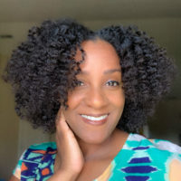 brown skin lady smiling